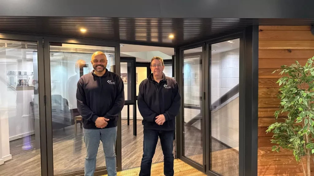 clearview team members standing in front of bifold door