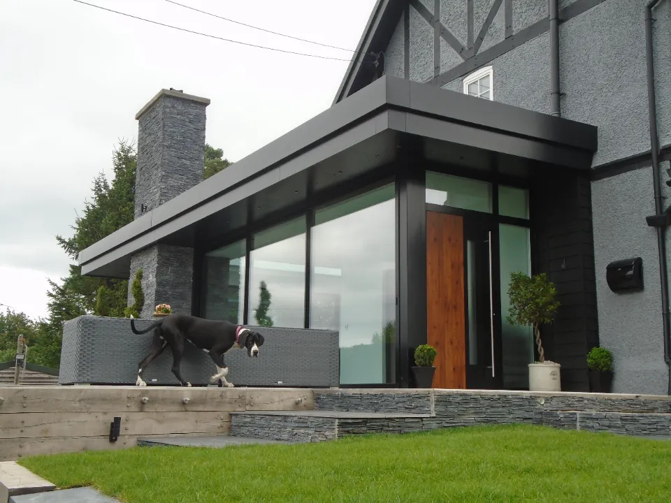 exterior view of house with aluminium framed windows
